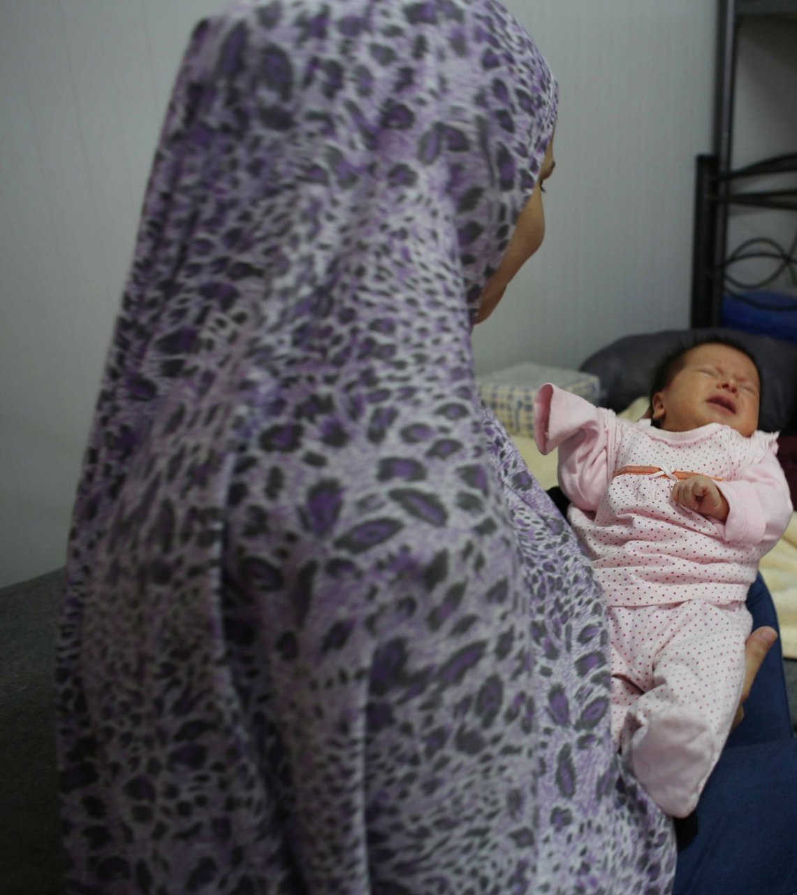A newborn and a mother alone